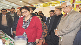 Governor NN Vohra, Usha Vohra and MoS Health Shabir Ahmad Khan visiting stalls in AROGYA Mela at Parade Ground Jammu on Tuesday.