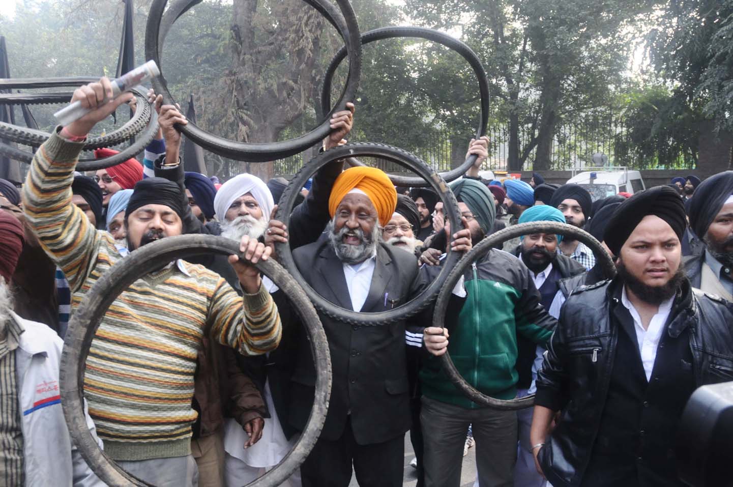 Sikhs protesting outside the residence of Rahul Gandhi against his statement on 1984 riot in New Delhi on Thursday. (UNI)