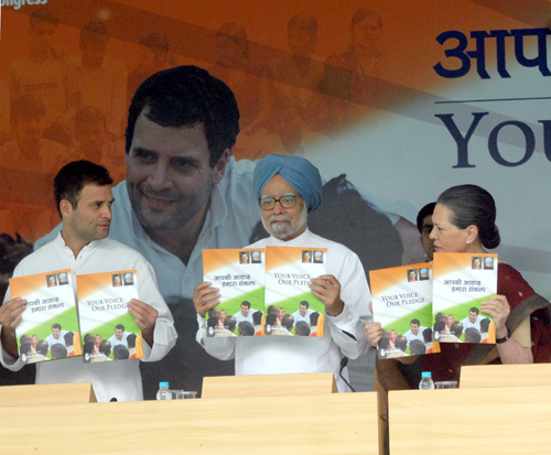 Congress president and UPA Chairperson Sonia Gandhi with vice president Rahul Gandhi and Prime Minister Dr Manmohan Singh releasing party's manifesto for the Lok Sabha elections-2014 in New Delhi on Wednesday. (UNI)