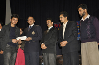 Director General Youth Services and Sports, Navin Agarwal distributing scholarships among deserving students in Jammu on Monday.