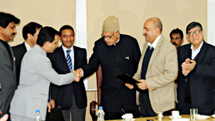 Union Minister for New and Renewable Energy Dr Farooq Abdullah during signing of MoU on Monday.