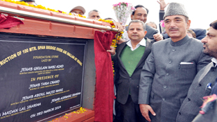 Union Minister for Health, Ghulam Nabi Azad laying foundation stone of bridge in tehsil Bishnah on Monday.