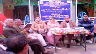 Poets and scholars at a poetic meet organized by Adbi Kunj at Jammu on Wednesday.