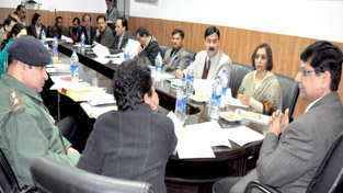 FC Revenue Dr Arun Kumar chairing a meeting at Jammu on Tuesday.