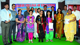 Winners of debate competition posing with the dignitaries at Adarsh College of Education in Samba.