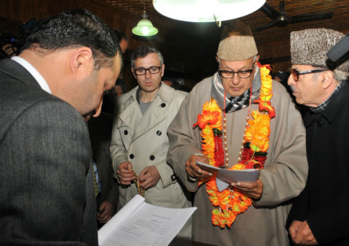 National Conference candidate, Dr. Farooq Abdullah accompanied by Chief Minister Omar Abdullah and Prof Saif-ud-Din Soz filing his nomination papers for Srinagar Lok Sabha constituency on Monday. —Excelsior/Amin War