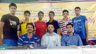 J&K fencers posing for a photograph alongwith officials after winning U-17 boys Sabre gold in Maharashtra on Monday.