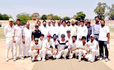 Jubilant KC Sports Club players posing for a photograph alongwith Minister for Sports, Raman Bhalla at MA Stadium on Tuesday.