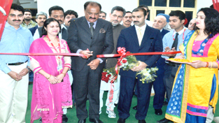 Former Minister & MLA Surjit Singh Slathia inaugurating Bachpan, a play school at Trikuta Nagar.