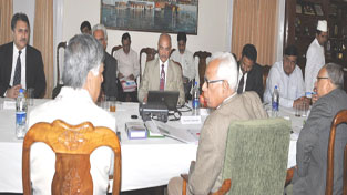 Governor N N Vohra chairing SKUAST-K Council meeting at Raj Bhavan on Saturday.