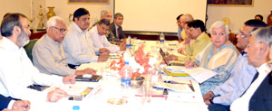Governor N N Vohra chairing Managing Committee meeting of IRCS at Raj Bhavan on Thursday.