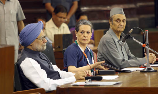 Congress President Sonia Gandhi, outgoing Prime Minister Manmohan Singh and senior party leader Karan Singh at the party's Parliamentary Board meeting at Parliament house in New Delhi on Saturday. (UNI)