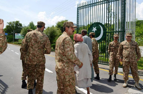 Army repatriates shepherds to Pakistan officials at Chakan-Da-Bagh on Wednesday.