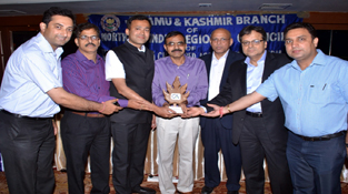 CA Vikram Garg, Chairman of the J&K Branch alongwith other executive members presenting memento to M.K. Bagri (ROC J&K). Also seen in the picture is CA. Anil Sharma, faculty on the subject.