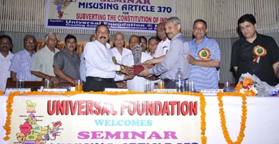 Dr Jitendra Singh being felicitated by Universal Foundation at Jammu on Sunday. -Excelsior/Rakesh