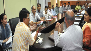 Divisional Commissioner Shantmanu chairing a meeting at Jammu on Thursday.