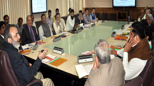 Chief Secretary Mohd Iqbal Khandey chairing meeting of State Executive Committee of SDRF at Srinagar on Monday.