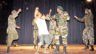 A scene from the Punjabi play ‘Kandyali Taar’ staged by Kasali Kala Manch.