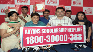 Dr Kiran Bedi alongwith Dr Anshu Kataria launching toll free number of ‘Aryans Special Scholarship Scheme’ for J&K students at Jammu on Tuesday. —Excelsior/Rakesh