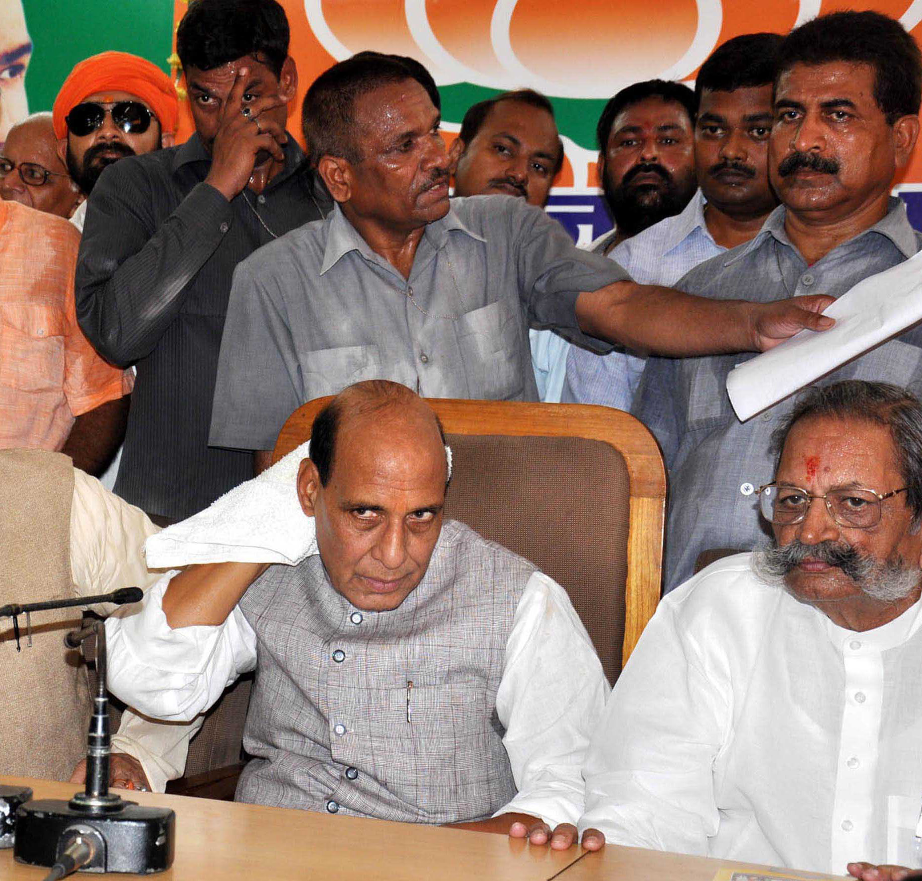 Union Home Minister Rajnath Singh, senior leader Lalji Tandon and Shiv Kumar during press conference at party office in Lucknow on Saturday. (UNI)