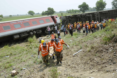 Rescue work in progress at the accident site after twelve coaches of New Delhi-Dibrugarh Rajdhani Express derailed near Chhapra in Bihar on Wednesday. (UNI )