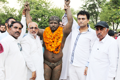 Wrestlers being felicitated on Sunday.