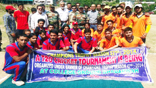 Cricketers posing for a photograph alongwith dignitaries and officials during inaugural ceremony of T20 Championship in Bhadarwah.