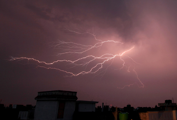 Lightening over Jammu city on Saturday evening. -Excelsior/Rakesh
