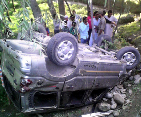 The ill-fated vehicle carrying Amarnath yatris after accident at Darend Nagbal in district Ganderbal on Friday.
