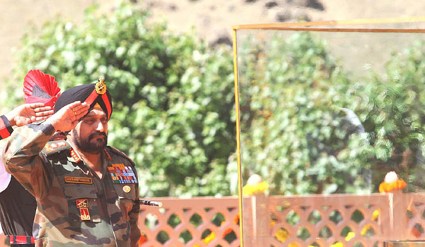 Army chief General Bikram Singh pays homage to martyrs at Drass on Friday. (UNI)