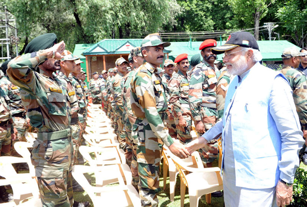 Prime Minister, Narendra Modi meeting the soldiers and officers, at Badami Bagh Cantonment in Srinagar on Friday.