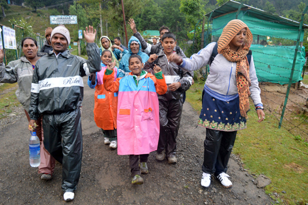 Amarnath bound pilgrims from Nunwan base camp in Pahalgam on Sunday. -Excelsior/Sajad Dar
