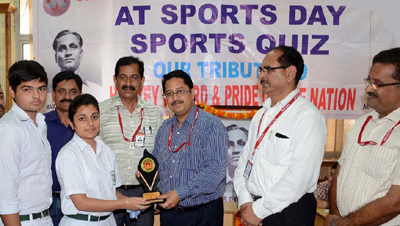 Winner being felicitated by the dignitaries during celebration of National Sports Day.