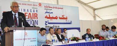 Governor NN Vohra addressing gathering at the inauguration of Book Fair at Kashmir Haat on Saturday.