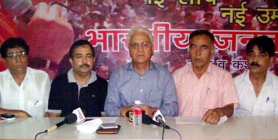 BJP leader Moti Koul addressing a press conference at Party headquarters in Jammu on Wednesday.