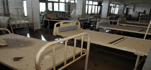 A badly damaged ward of Lal Ded Maternity Hospital in Srinagar on Monday. —Excelsior/Amin War