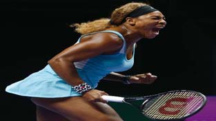 Serena Williams of the U.S. shouts as she wins a point against Caroline Wozniacki of Denmark.