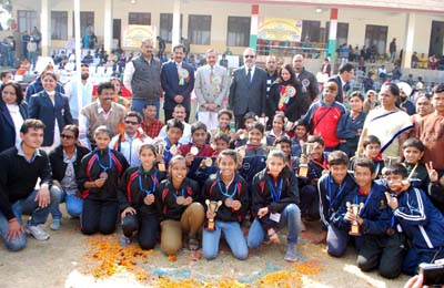 Winners posing alongwith the dignitaries during concluding ceremony of 60th National School Games in Jammu. -Excelsior/Rakesh