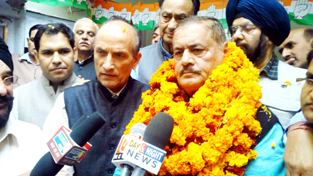 BJP MLA from Basohli speaking to media after joining Congress Party at PCC office in Jammu on Sunday. -Excelsior/Rakesh