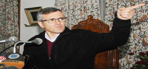 Chief Minister Omar Abdullah addressing a press conference in Srinagar on Monday. —Excelsior/Amin War
