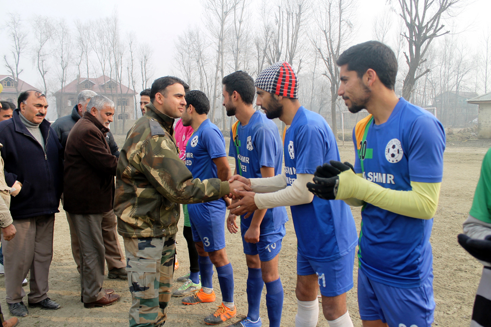 Dignitaries interacting with footballers during one-off match of Pampore Flood Victims Memorial Cup Football.