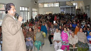 Former Minister Raman Bhalla addressing public gathering at Nai Basti on Tuesday.