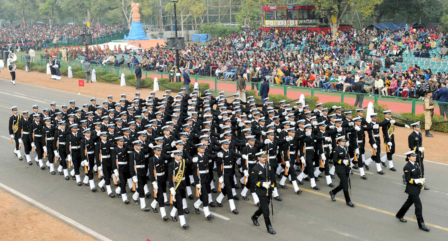 The Coast Guard marching contingent passes through the Rajpath during the full dress rehearsal for the Republic Day Parade-2015, in New Delhi on Friday.