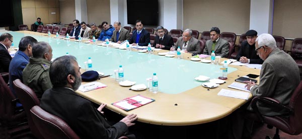 Governor NN Vohra reviewing problems of border and Kashmiri migrants and flood victims in Jammu on Tuesday.
