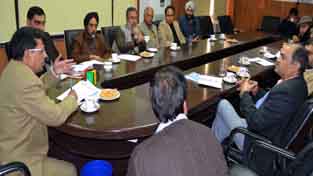 Divisional Commissioner Shantmanu chairing a meeting at Jammu on Friday.