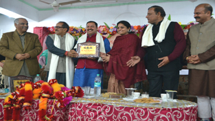 Deputy Chief Minister, Dr Nirmal Singh flanked with MoS Education, Priya Sethi & others during a public meeting at Reasi on Sunday.