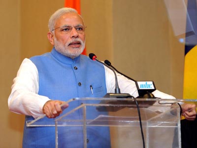 Prime Minister Narendra Modi delivering media statement after delegation level talks with his Mauritius counterpart Anerood Jugnauth, in Port Louis on Wednesday. (UNI)