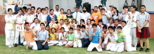 Winners posing along with dignitaries during the closing function of Inter-School Judo Competition at GD Goenka Public School in Jammu.