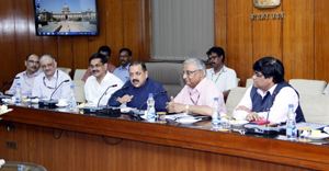 Union Minister Dr Jitendra Singh, flanked by Union Secretary AYUSH Nilanjan Sanyal and Union Secretary DoPT Sanjay Kothari, presiding over a meeting to discuss arrangements for observing "International Day of Yoga" on June 21 at New Delhi.