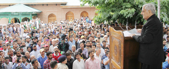 Chief Minister Mufti Mohammad Sayeed addressing people at Martyrs Graveyard in Srinagar on Monday.